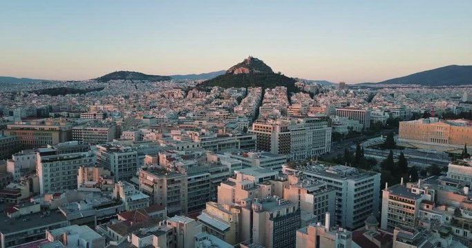 Athens Capital Of Greece - View Of The Beautiful City With High Rise Buildings and Green Trees - Aerial Shot