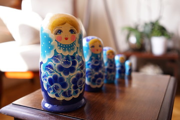 matryoshka dolls. Matryoshka dolls in sequence. local toys on the wooden table. 