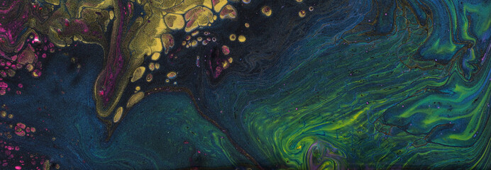 art photography of abstract marbleized effect background. Black, yellow, green, pink, purple and blue creative colors. Beautiful paint