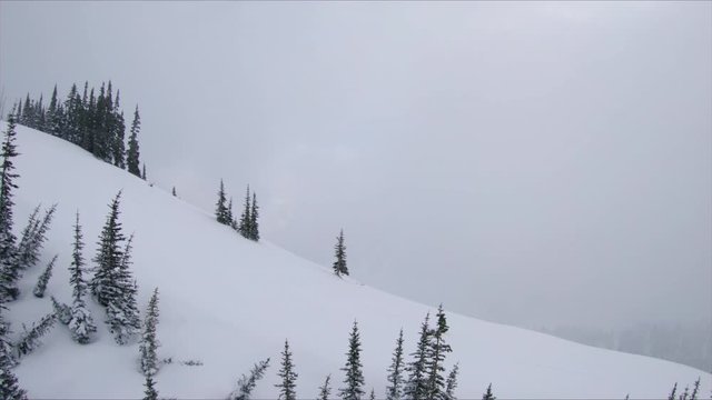 Hiking Isolation Aerial Climbing Big Mountain in Winter Snow