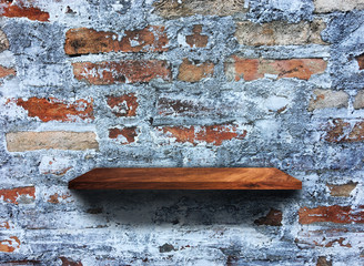 Rustic wooden shelf on grey concrete wall texture background with clipping path. pattern wallpaper