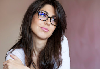 Fototapeta premium Beautiful Young Woman with Eyeglasses with Black Frames 