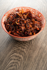 friend tempeh with hot soy sauce in a decorated bowl