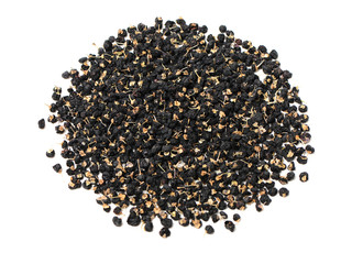 Traditional Chinese black herbs dried wolfberry on white background