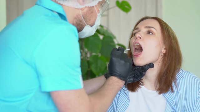 Taking swab test probe sample laboratory analysis.