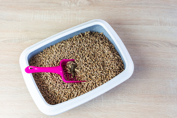 Pellet litter box with shovel picks up debris, cat box, cat poo 
 
