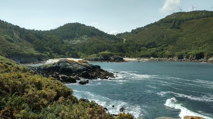 small beach between mountains