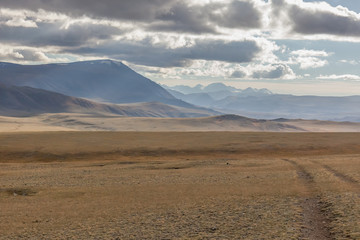 The road in the desert. Central Asia between the Russian Altai and Mongolia