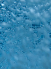 close up water bubble splashing in the swimming pool, underwater background