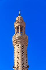 Minaret of mosque in Dahar neighborhood (old town of Hurghada) in Egypt
