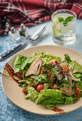 Warm salad with beef, cherry tomatoes and sun-dried tomatoes. Healthy food