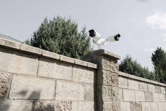 Security Your Home Cameras and Motion Detectors - Powered by Adobe