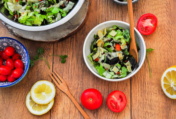 salad with fresh vegetables and lemon