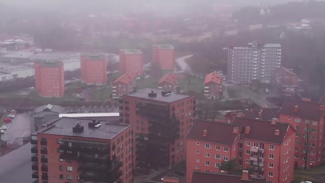Residential blocks in Bor&aring;s , Sweden during a foogy day.