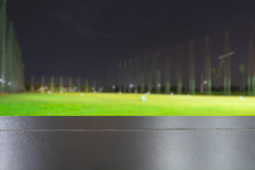 bar or table with blur background Golf driving range