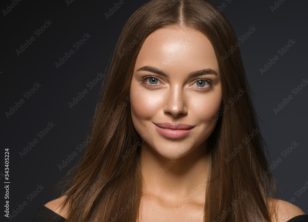 Wall mural Face woman eyes smile close up beauty natural make up clean fresh skin beautiful hair long smooth