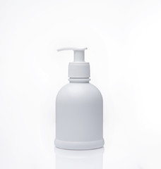 white bottle with reflection isolated on white background.