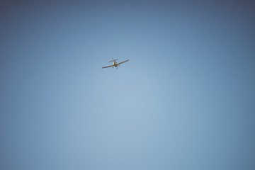 Airplane in the blue sky