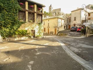 Colorful and narrow street in Provence village.