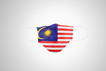 Obraz premium Medical protective mask with flag of Malaysia
