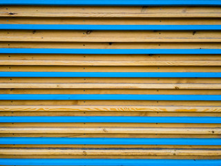 Obraz premium Brown and blue plank wall texture background, mobile photo