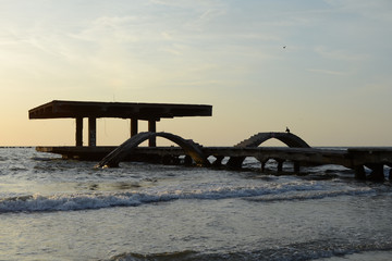 Fototapeta premium Sunrise, black sea, Mamaia, the old pontoon, Constanta, Romania.