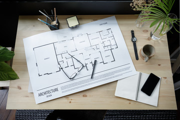 Top view workspace mockup of architectural project with architectural project plan, engineering...