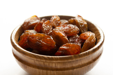 Golden raisins in the plate.