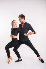Salsa, kizomba and bachata dancers on white background. Social dance concept.