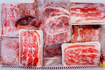 Raw meat packed on a box in the freezer