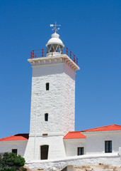 Cape St Blaize lighthouse against blue sky during summer.