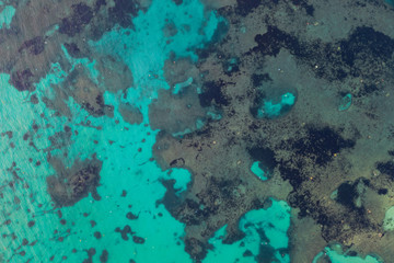 Fototapeta na wymiar Aerial top view Nature texture blue green sea from above