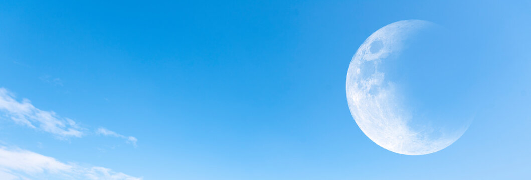 Moon and clear blue sky as background, panoramic view - Powered by Adobe