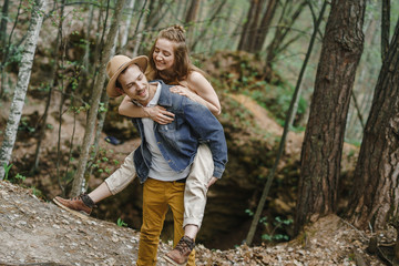 A man and a woman in a cave