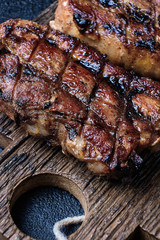 Closeup of pork ribs grilled on cutting board