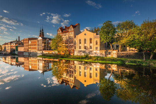 Spring view of city Opole in Silesia in Poland. Historical old town in gold light.