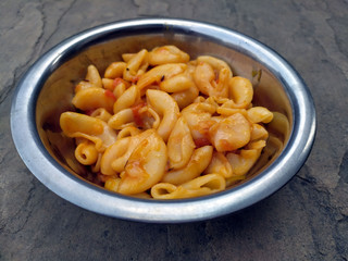 some yellow fresh eatable food put in a steel bowl