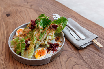 Caesar salad cooked in Asian way - creative fusion food