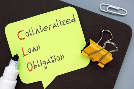 Business concept about Collateralized Loan Obligation CLO with inscription on the sheet.