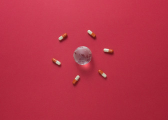 Concept of new Coronavirus -Covid 2019 with medicines and World globe.Top view.