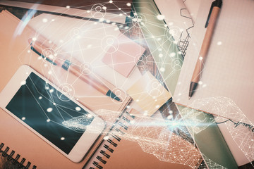 Double exposure of social network theme drawing over table with phone. Top view. People connecting concept.