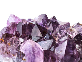 purple rough amethyst quartz crystals on white background