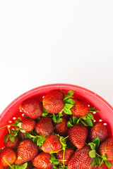Fresh and Red Strawberries on White Background