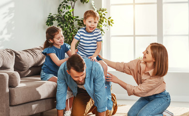 Happy family having fun at home