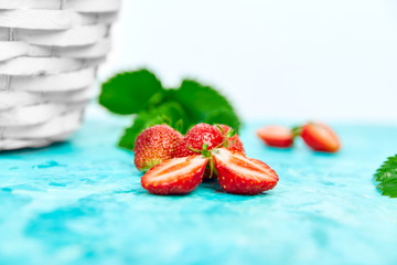 Strawberries in white basket. Fresh strawberries. Beautiful strawberries.