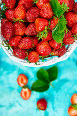Strawberries in white basket. Fresh strawberries. Beautiful strawberries.