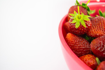 Fresh and Red Strawberries on White Background