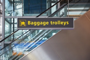Airport sign board for baggage trolleys