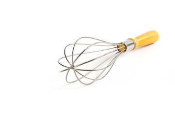 Metal whisk on white back ground.