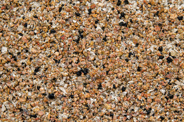 Fine colored granite chips as texture, background, wallpaper